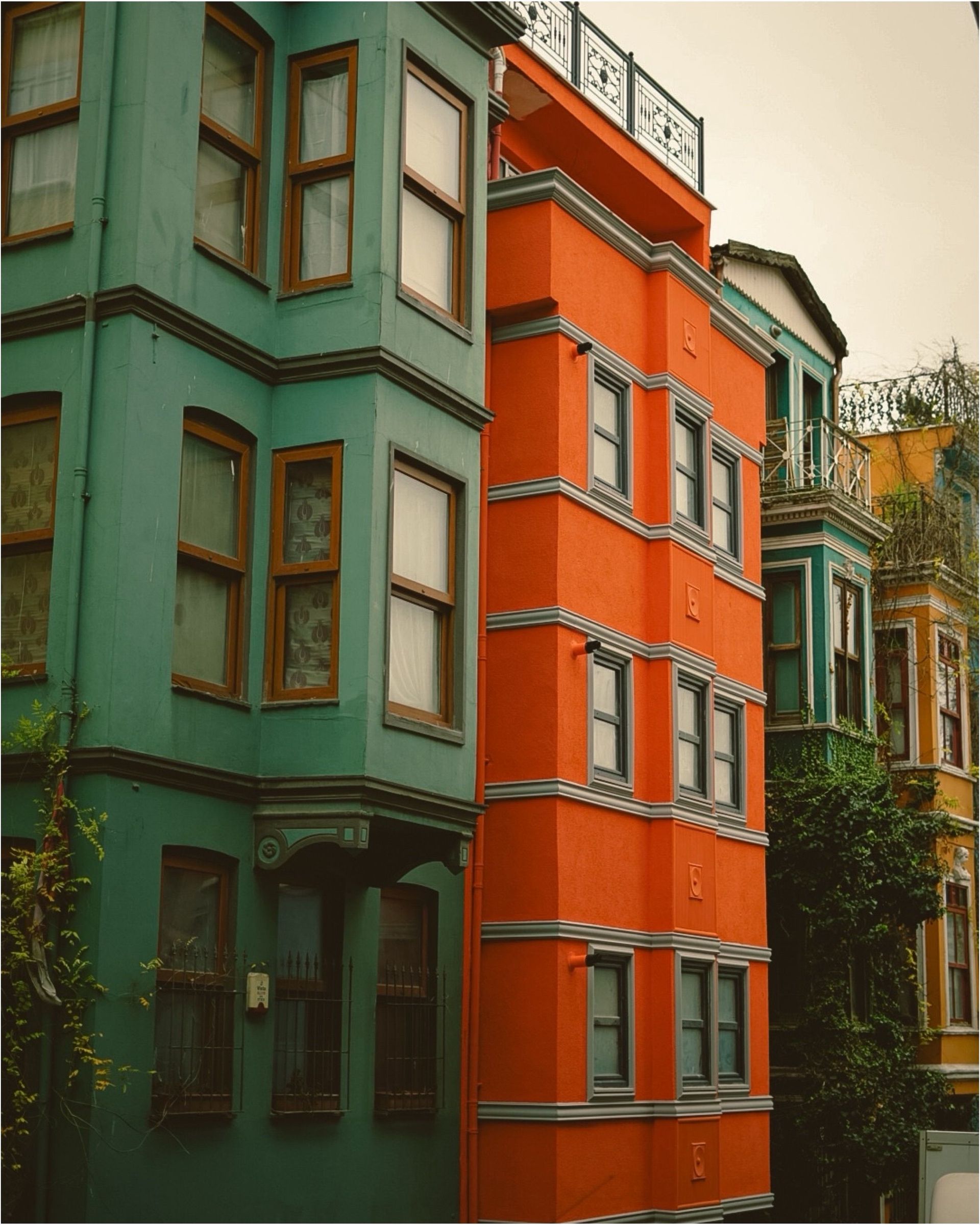 Vibrant urban building facades in a rich color palette, ideal for cityscape themes.